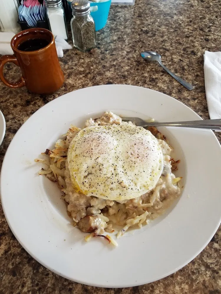 M29 Southern Skillet Sausage Gravy and Sausage Links over Hash Browns with over Easy Eggs